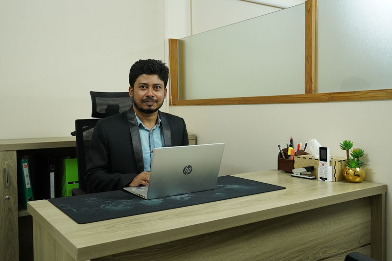 The Head of Accounts and HR at his desk
