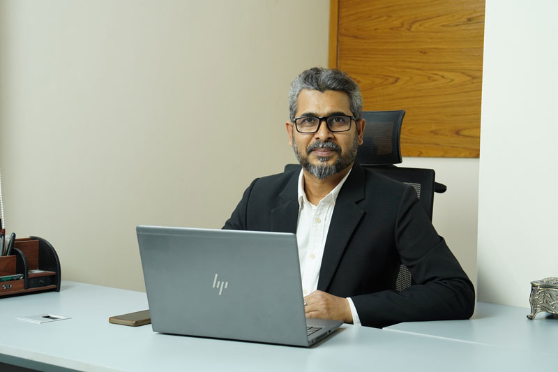 The Distribution Manager at his desk