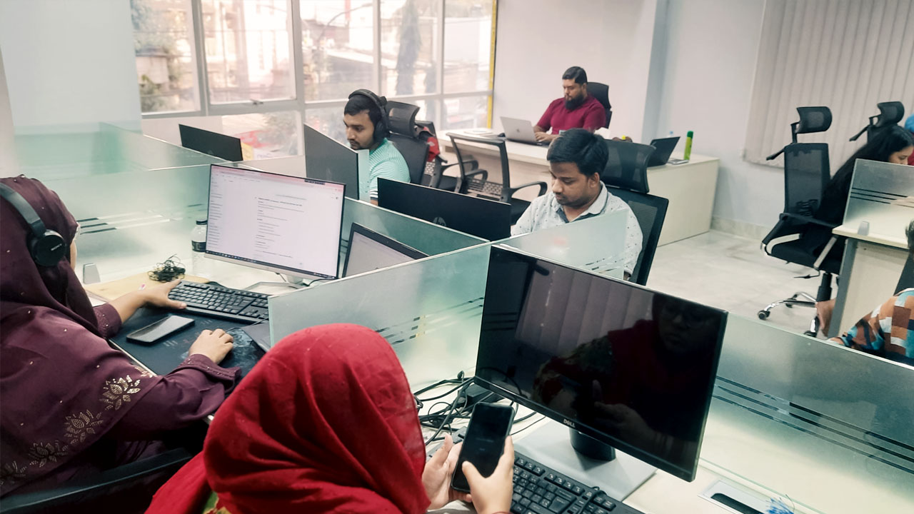 IT staff working at their desks